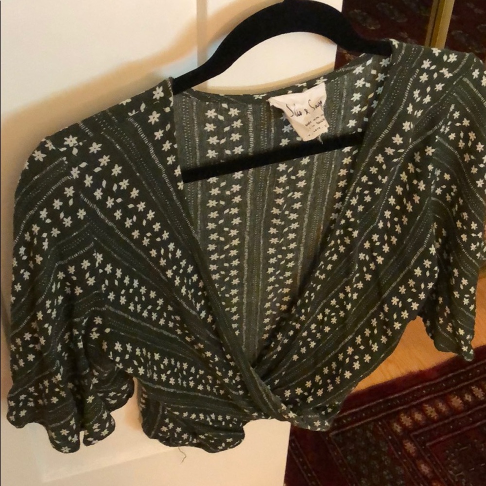 Swing sleeves wrap blouse.